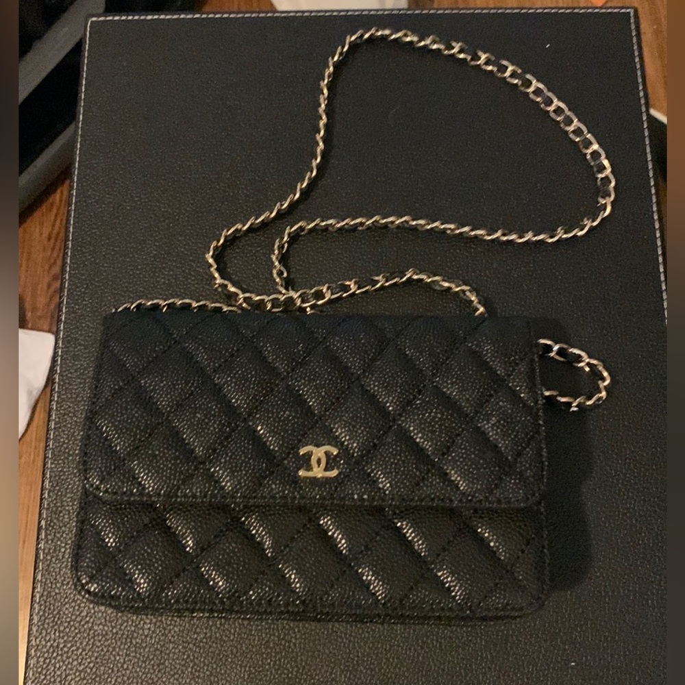 Black Caviar Wallet on a chain.